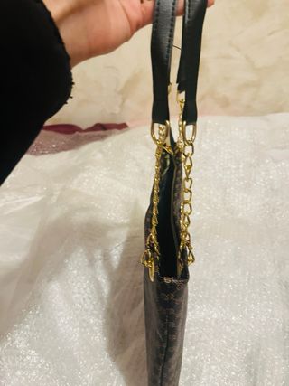 Bolso de hombro con flamencos dorados