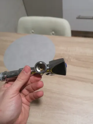 Llave doble de agua cromada con tubo extensible