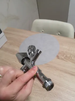 Llave doble de agua cromada con tubo extensible