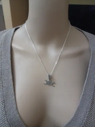 Collana acciaio con tripla luna e stella