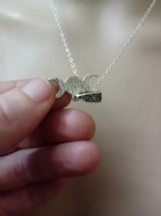 Collana acciaio con tripla luna e stella