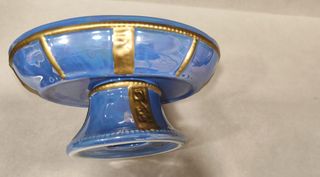 Centro de mesa G di Panzano azul y dorado