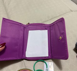 Set accessori: portafoglio, bracciale, orecchini