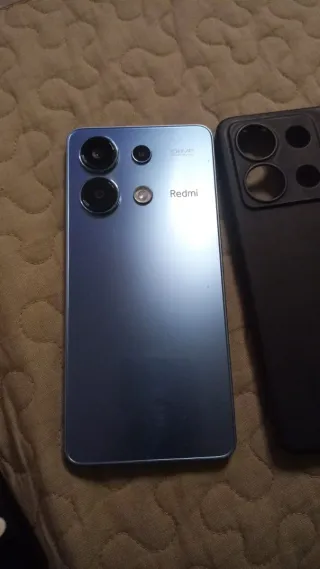 Xiaomi redmi 13 su caja y cargador 4 meses de uso