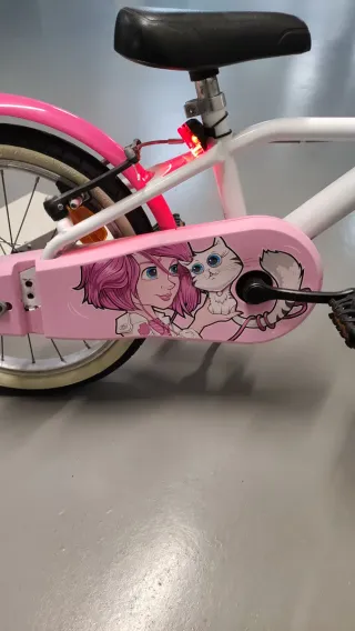 Bicicleta infantil rosa y blanca