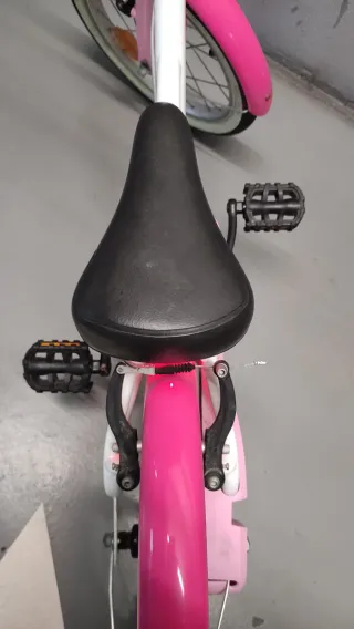 Bicicleta infantil rosa y blanca