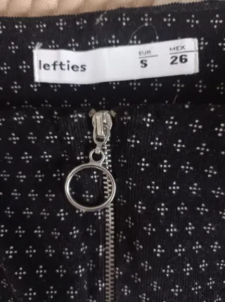 Falda negra cremallera frontal