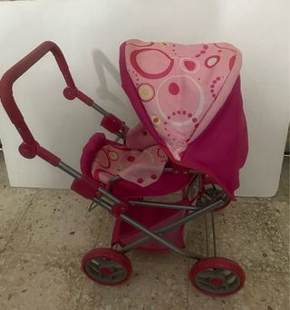 Cochecito de muñecas rosa