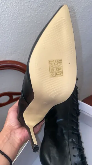 Botas altas de tacón con cordones