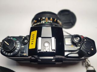 Canon A-1 + Lente FD 50mm f/1.8 SC