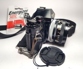 Canon A-1 + Lente FD 50mm f/1.8 SC