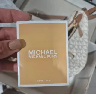 Riñonera Michael Kors Blanca y Marrón