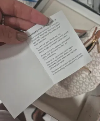 Riñonera Michael Kors Blanca y Marrón