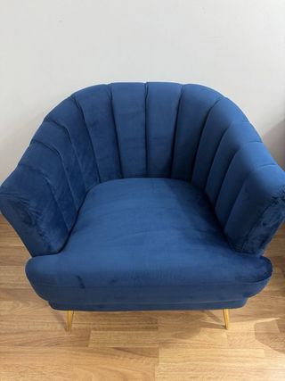 Sillón azul terciopelo patas doradas