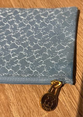 Monedero azul con cremallera dorada
