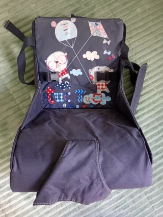 Alzador de bebé. Marca Tuctuc.