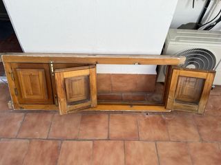 Ventanas de madera con postigos