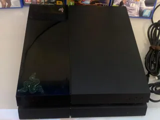 PS4 Negra con Mando y 4 Juegos