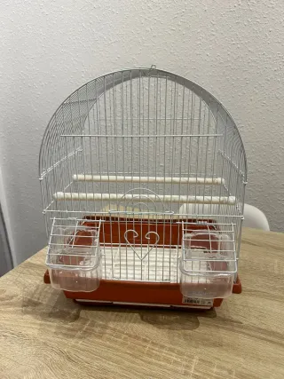 Jaula para pájaros blanca y marrón