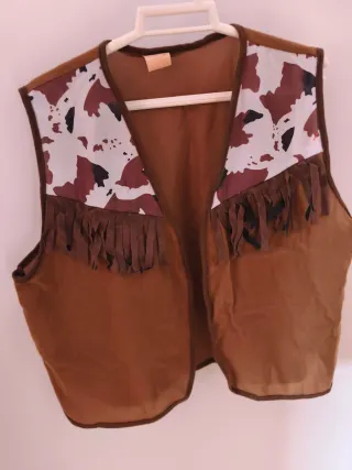 Chaleco de vaquero con pistola y chapa