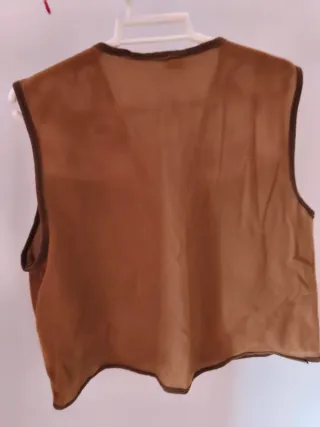 Chaleco de vaquero con pistola y chapa