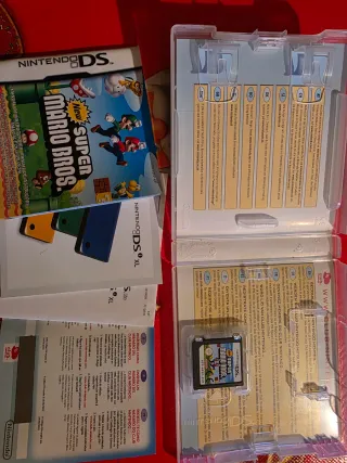 Nintendo DS Lite + Lote Pokémon y Mario Bros
