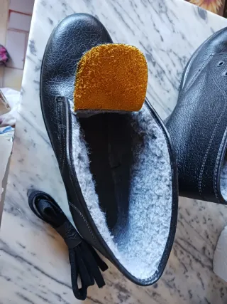 Scarpe alte imbottite nere nuove