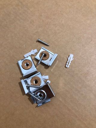 4 pinzas para espejo con tornillos y tacos