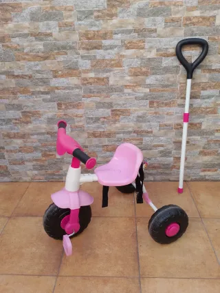 Triciclo rosa infantil