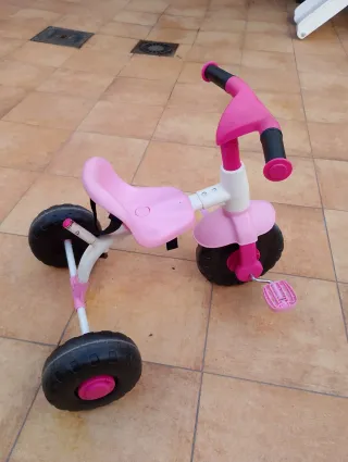 Triciclo rosa infantil