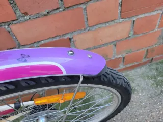 Bicicleta infantil Btwin rosa y blanca