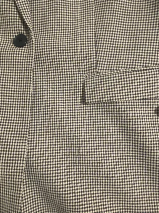 Americana de cuadros marron y blanco