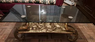 Mesa baja cristal y metal dorado
