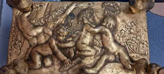 Mesa baja cristal y metal dorado