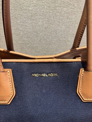Bolso Michael Kors azul y piel camel