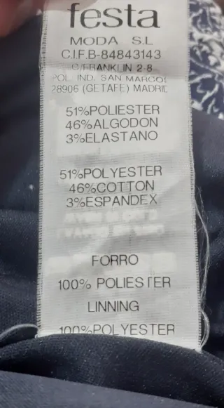 Vestido bordado blanco y azul marino