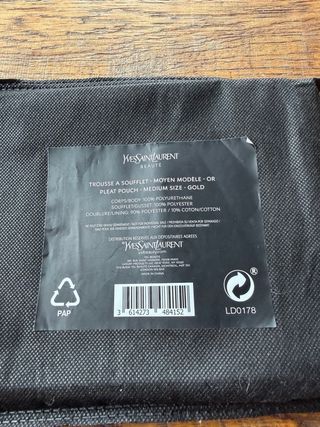 2 neceseres YSL Beauté negro y dorado