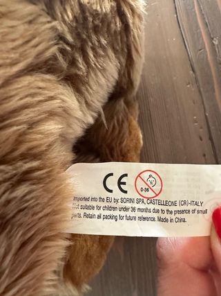 Peluche cane marrone con sciarpa