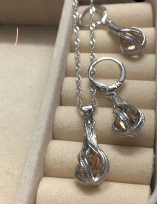 Conjunto de plata con piedras naranjas