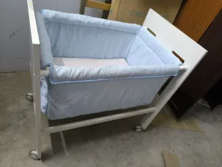 Minicuna con ruedas
