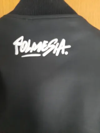 Cazadora bomber negra y blanca