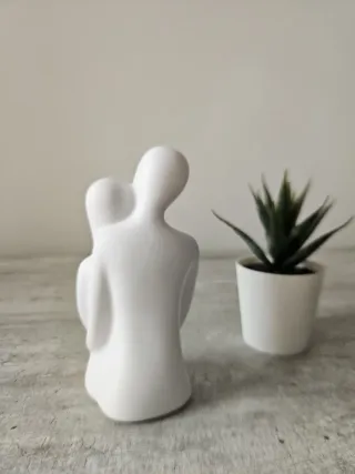 Statuetta ceramica abbraccio