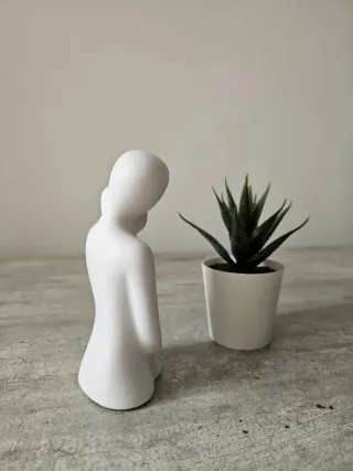 Statuetta ceramica abbraccio