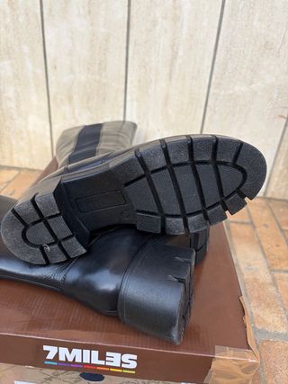 Stivali alti in pelle neri