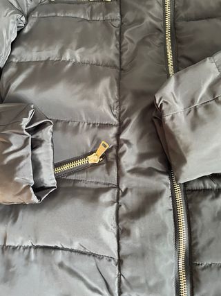 Giaccone donna nero con zip dorate