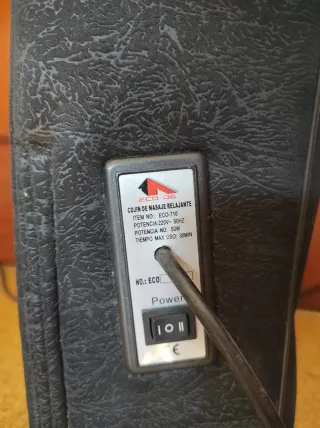 Cojín masajeador con luces rojas