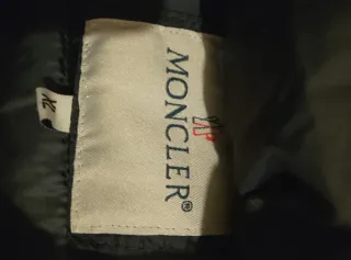 Piumino Moncler nero uomo invernale con cappuccio