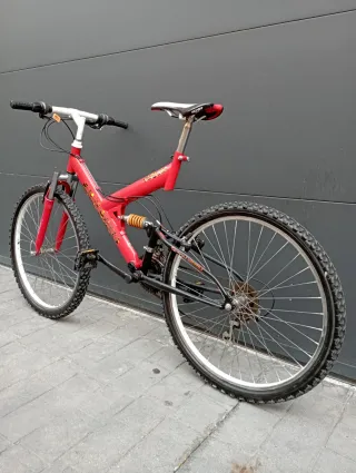 Bicicleta Montaña Roja Doble Suspensión
