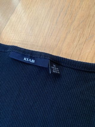 Pijama premamá azul y blanco y pantalón negro