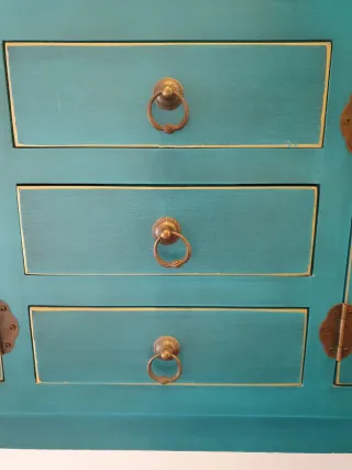 Consola estilo oriental azul y dorada